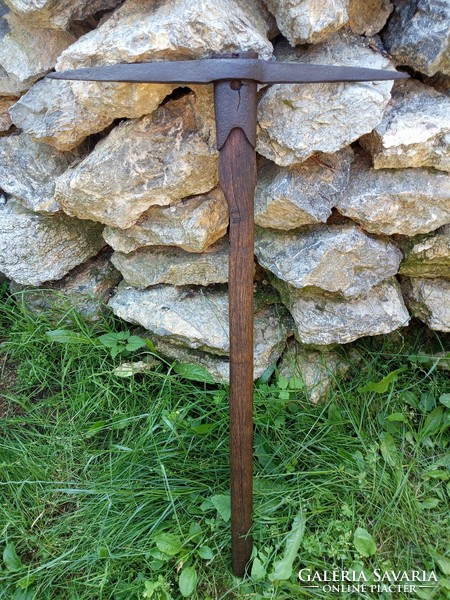 Old miner's pickaxe, wrought iron.