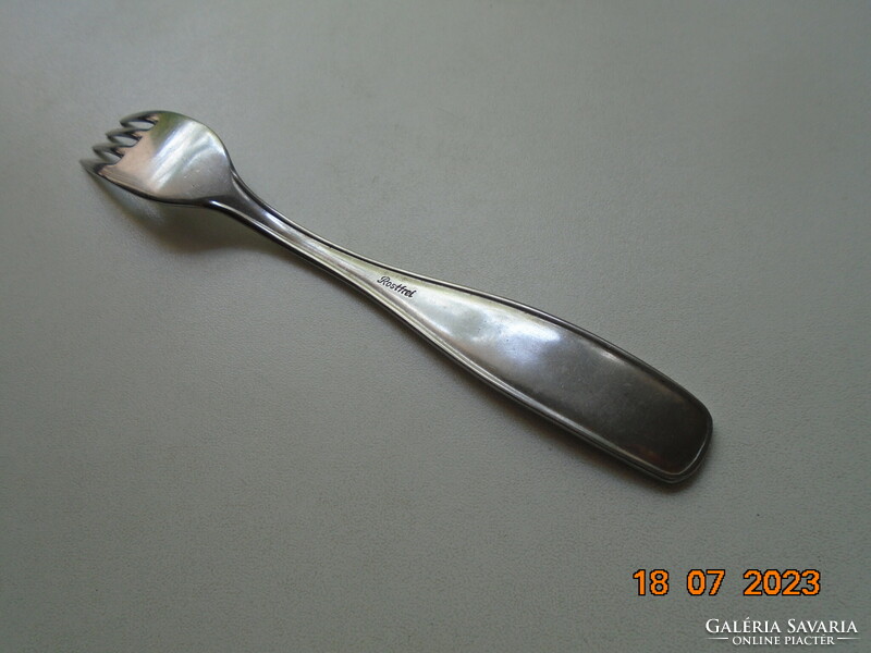 Stainless steel children's fork marked with a convex scooter clown on the handle