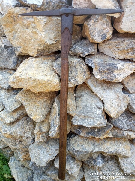 Old miner's pickaxe, wrought iron.