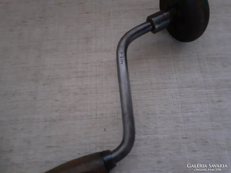 Old wrought iron hand drill with master mark