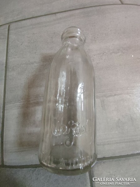 Old collection of four milk bottles