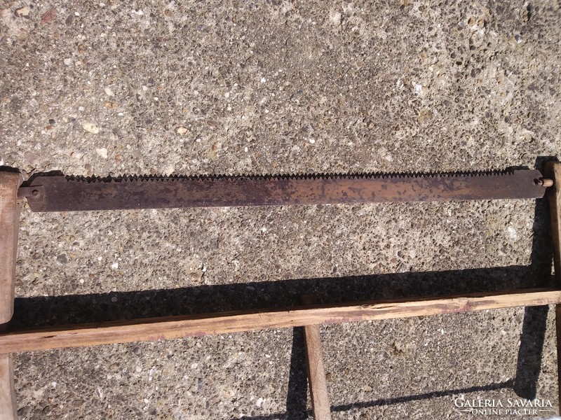 Old wooden frame saw