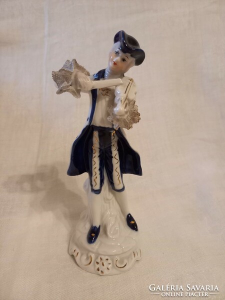 Cobalt blue colored porcelain lady in lace dress with basket and porcelain gentleman with violin 5000 ft/piece