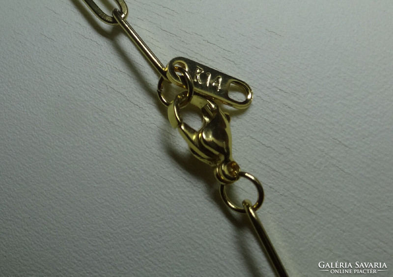 Marked medical metal 14 k. I saw this style on the page of a special women's necklace, jewelry store.