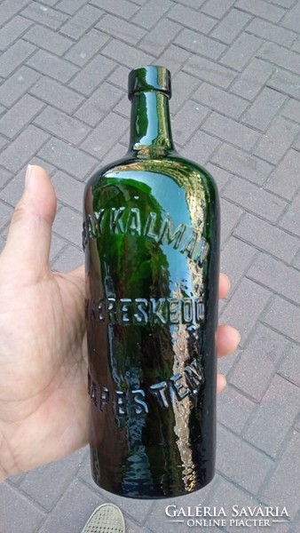 Old liquor bottle, with inscription, size 21 x 12 cm.