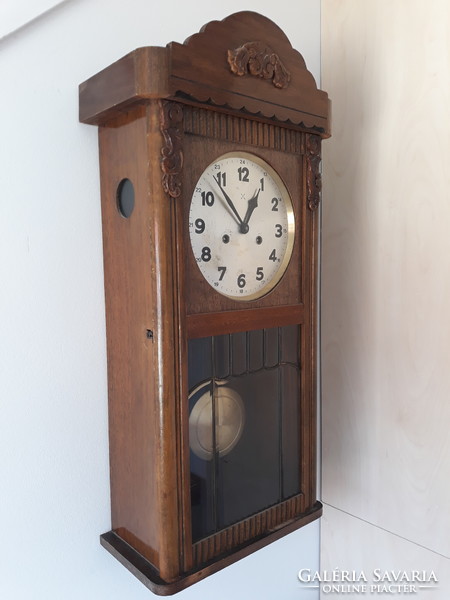 Antique, 100-year-old, working wall clock serviced, art deco style, in good condition