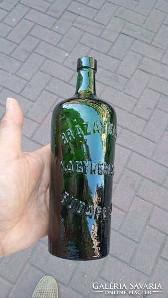 Old liquor bottle, with inscription, size 21 x 12 cm.