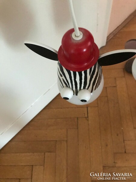 A very beautiful, funny figure children's room ceiling lamp. In new condition.
