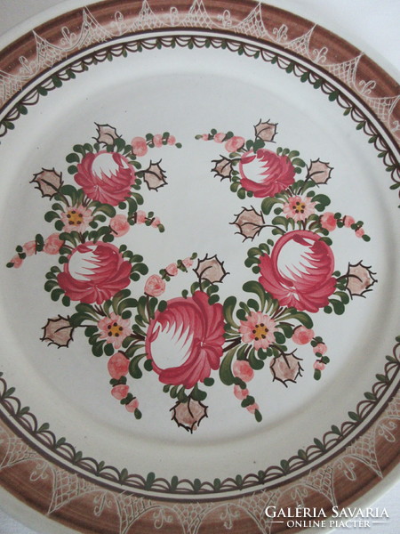 Old, marked, hand-painted German wall plate. Negotiable!