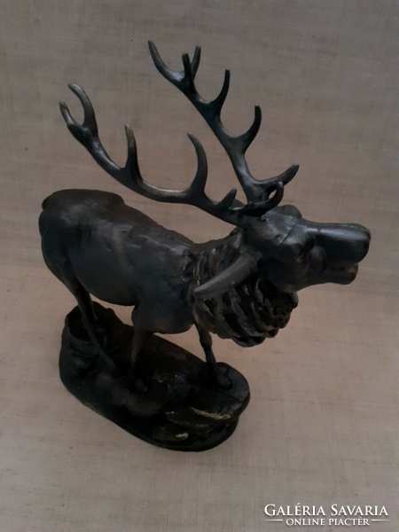 Old cast iron deer statue