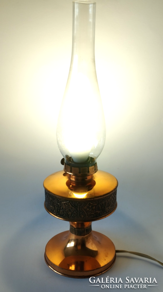 Industrial artist table lamp in the shape of a retro red copper kerosene lamp
