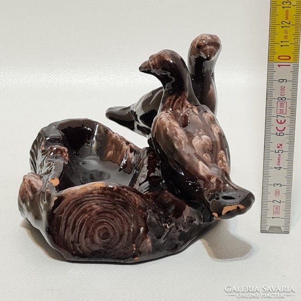 Brown glazed ceramic ashtray with doves marked 