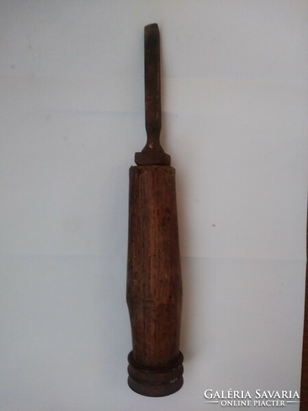 Old chisel with wooden handle