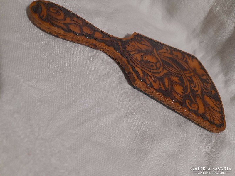Carved hand mirror