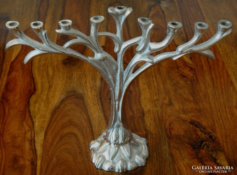 Menorah symbolizes a seven-pronged candlestick tree of life