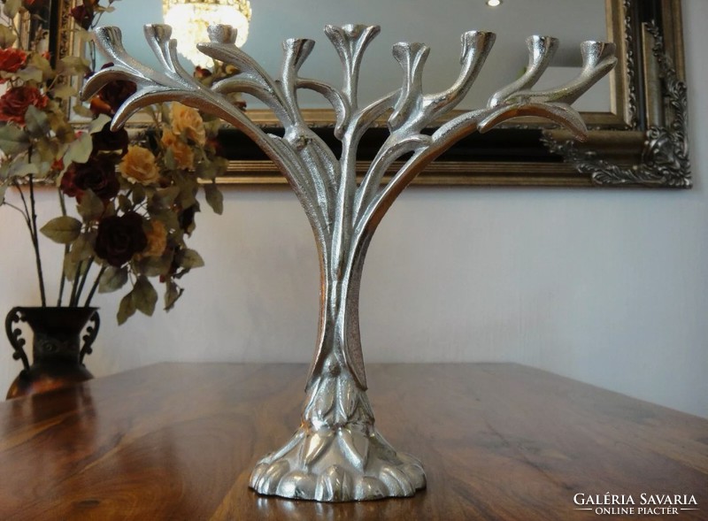 Menorah symbolizes a seven-pronged candlestick tree of life