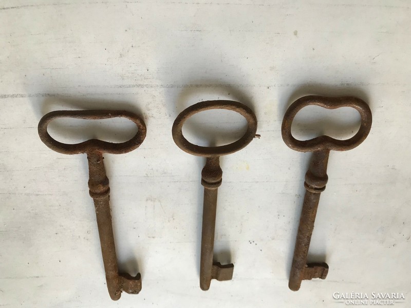 Old wrought iron door keys. Manual work. Length 12.5 cm when folded.