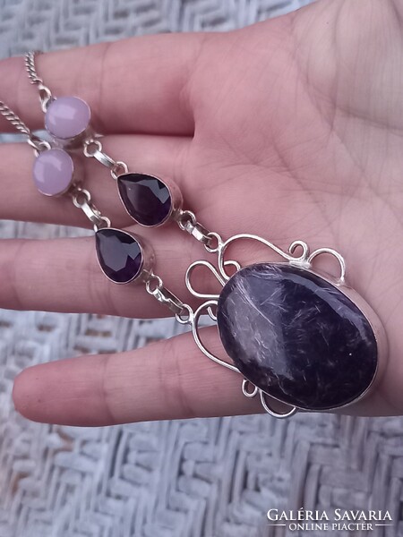 Silver necklaces decorated with rose quartz amethyst and charoite stones