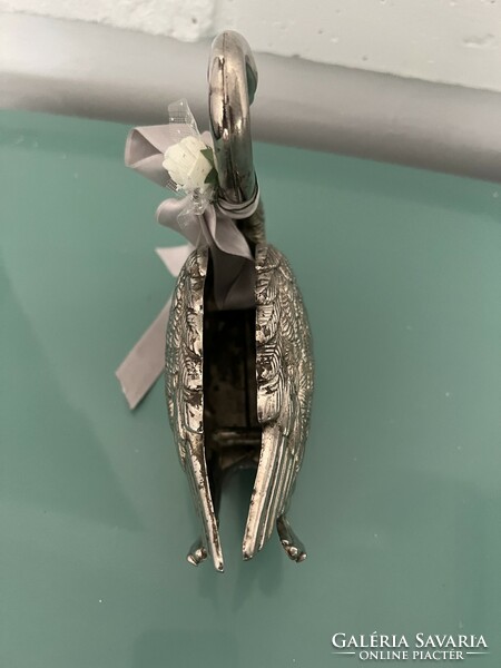 A wonderful silver napkin holder swan