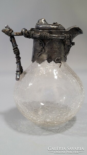 Old engraved glass jug