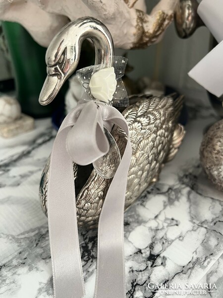 A wonderful silver napkin holder swan