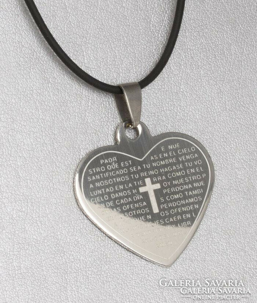 Heart pendant made of medical steel, polished to a high shine, on which 1 detail of padre nuestro is engraved.
