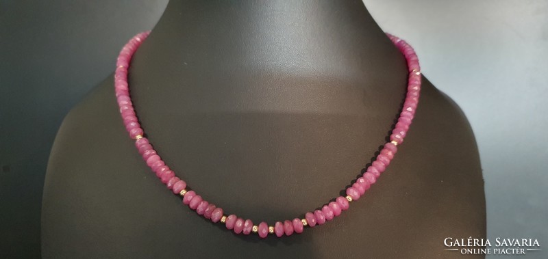 Faceted large ruby pearl string