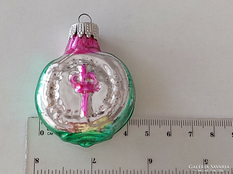 Old glass Christmas tree decoration clock or glass decoration in the shape of a water bottle