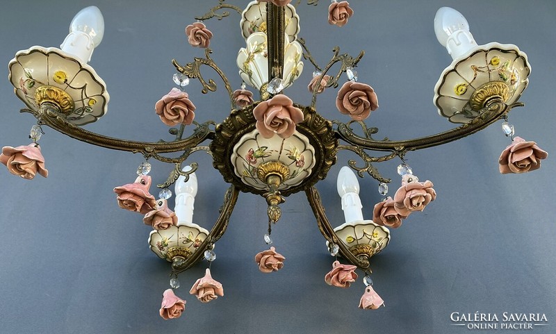 Chandelier with Venetian rose pendant.