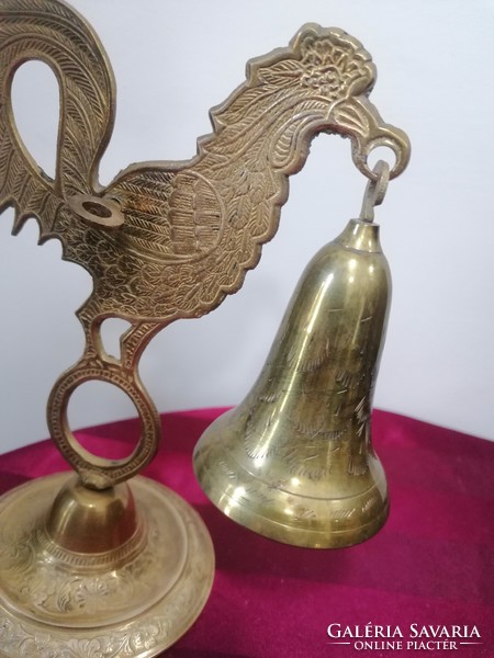 Cock-footed copper bell with racket