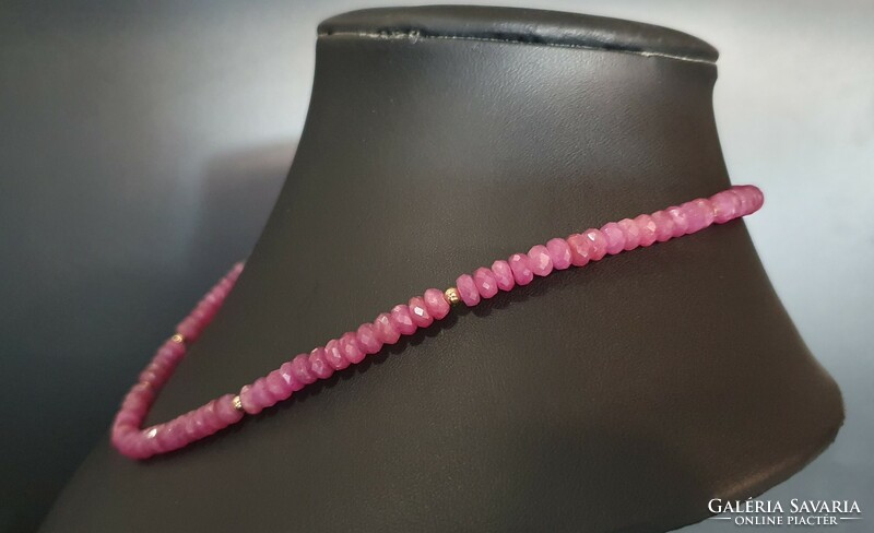 Faceted large ruby pearl string