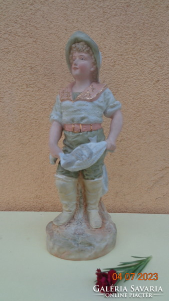 The fisherman lad, high-quality English porcelain in matte colors, is 33 cm high