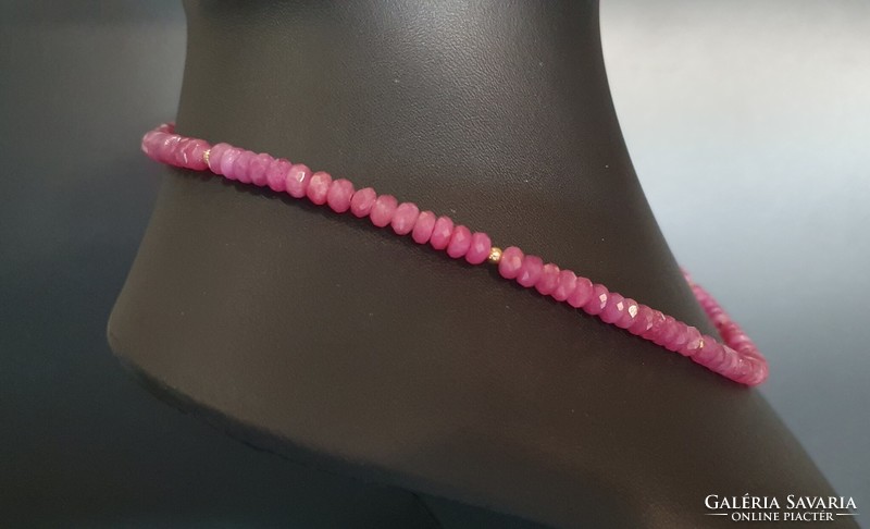 Faceted large ruby pearl string
