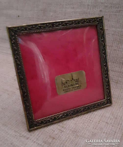 Old brass rectangular small picture frame with convex glass inside