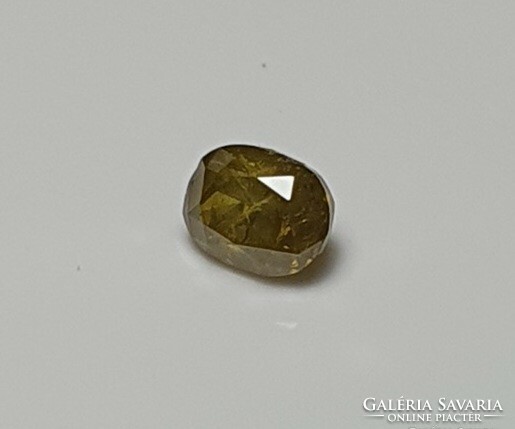 Fancy gold diamond 0.11 Carat.