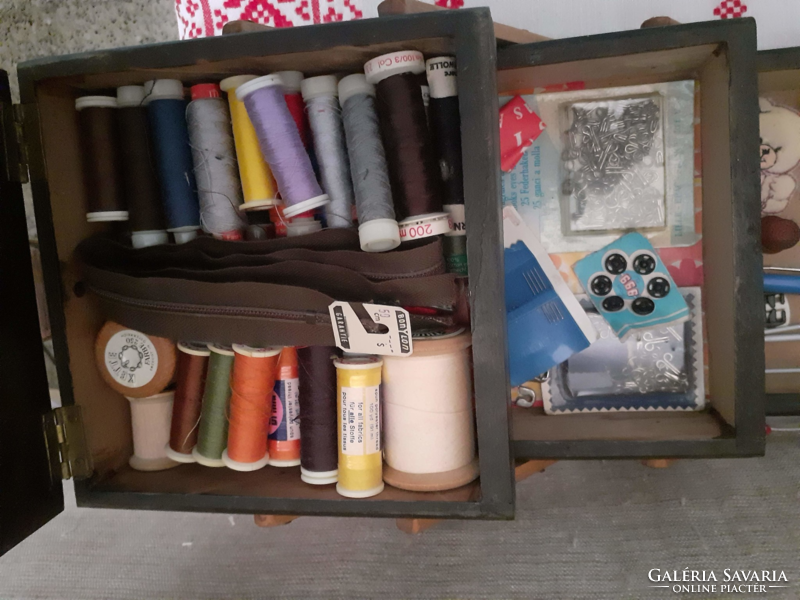 Openable multi-level sewing box with accessories in old preserved condition