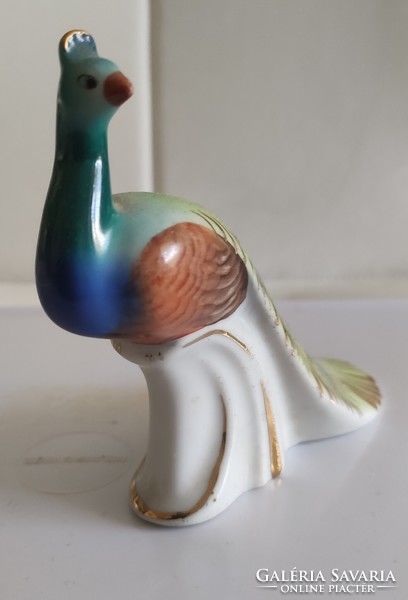 Porcelain peacock statue