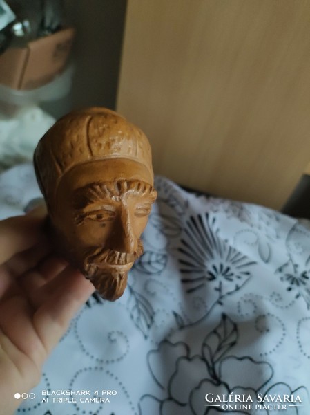 Pipe with a human head