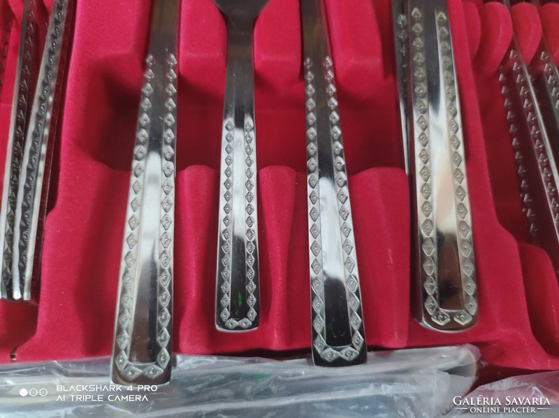 New set of cutlery, in a suitcase with a number lock