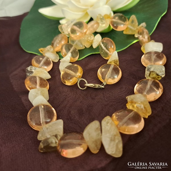 A string of citrine and glass beads is unique and showy