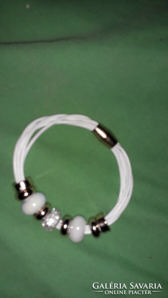 Interesting trendy magnetic metal and white stone ring bracelet according to the pictures k 4.