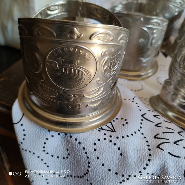 Old, decorative Russian metal cup holders