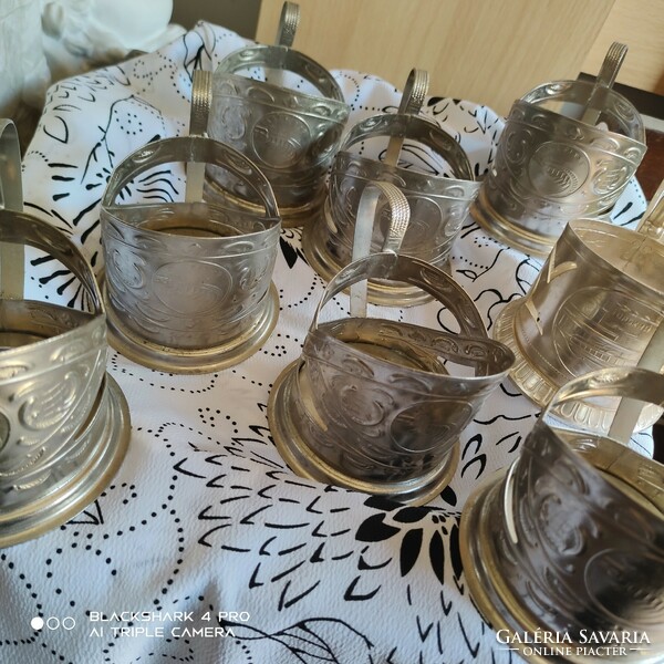 Old, decorative Russian metal cup holders