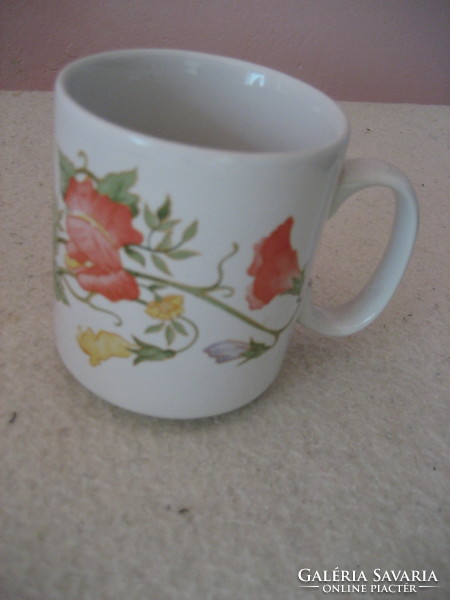 Apulum mug with flower pattern is damaged