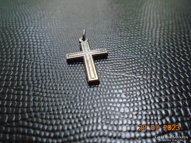 Antique silver cross pendant with fine chiseled pattern