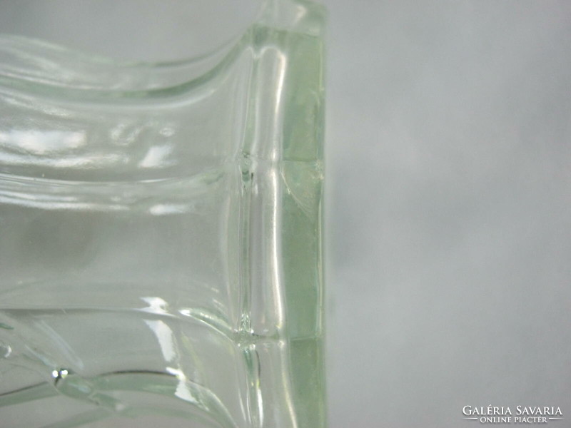 Pressed glass vase with flower pattern