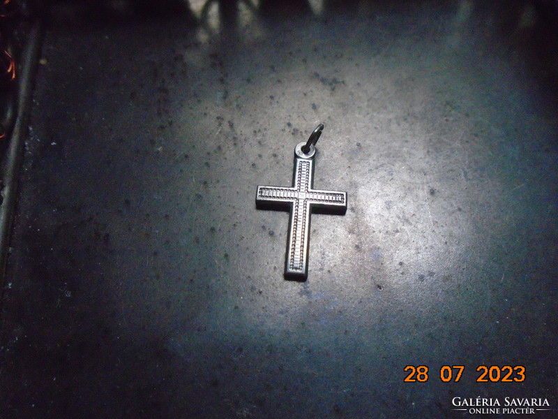 Antique silver cross pendant with fine chiseled pattern