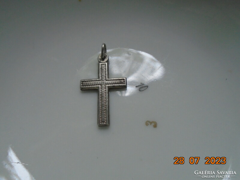 Antique silver cross pendant with fine chiseled pattern