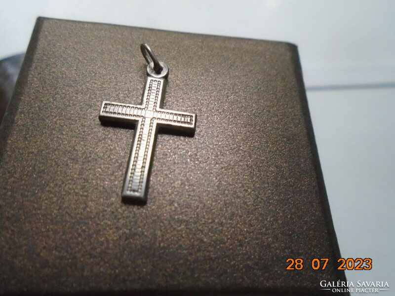 Antique silver cross pendant with fine chiseled pattern