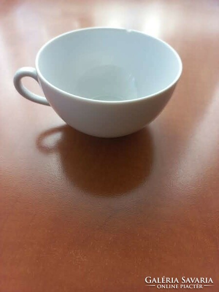 White porcelain tea cup - damaged